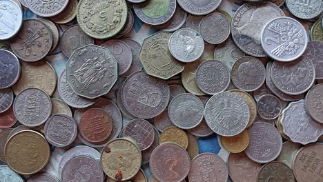 pile world coins from different countries