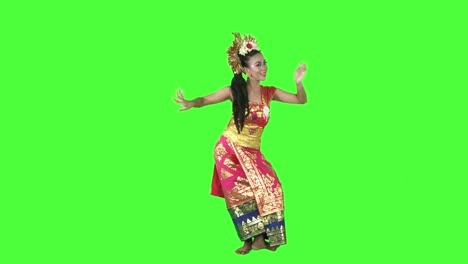 beautiful balinese dancer dancing in the studio