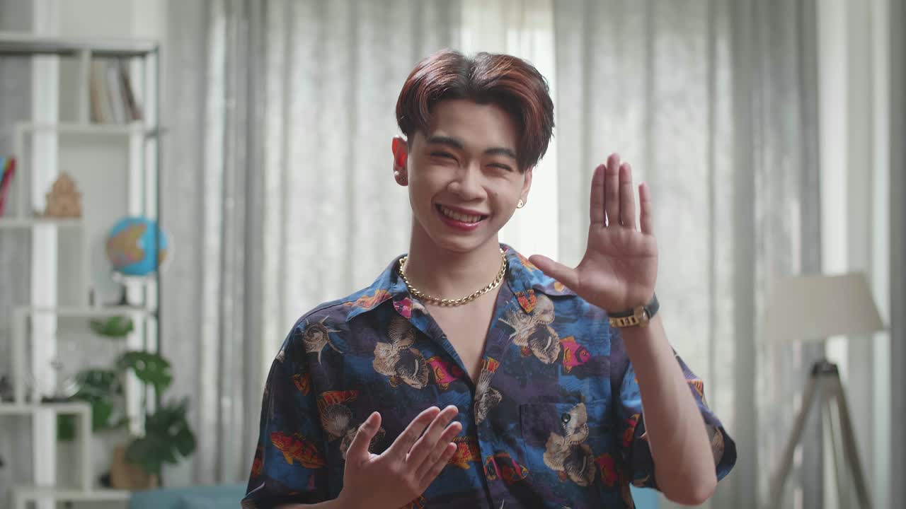 Asian Transgender Male Dancing While Shooting Video Content For Social Networks At Home