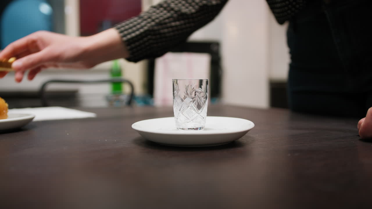Hands Of Young Woman Are Composing A Plate With Biscuits To Welcome Guests Home