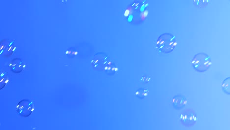 soap bubbles on light blue background a lot of soap bubbles isolated on light blue background