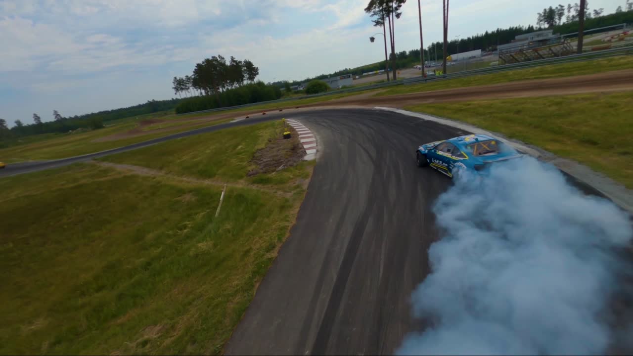 Christian Erlandsson drifting and chased by FPV drone at Lidköping Motorstadium