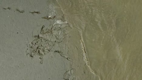 waves rolling on empty ganges banks