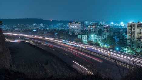 busy highway traffic time lapse of night time over mumbai - pune -bengaluru national highway, maharashtra, india