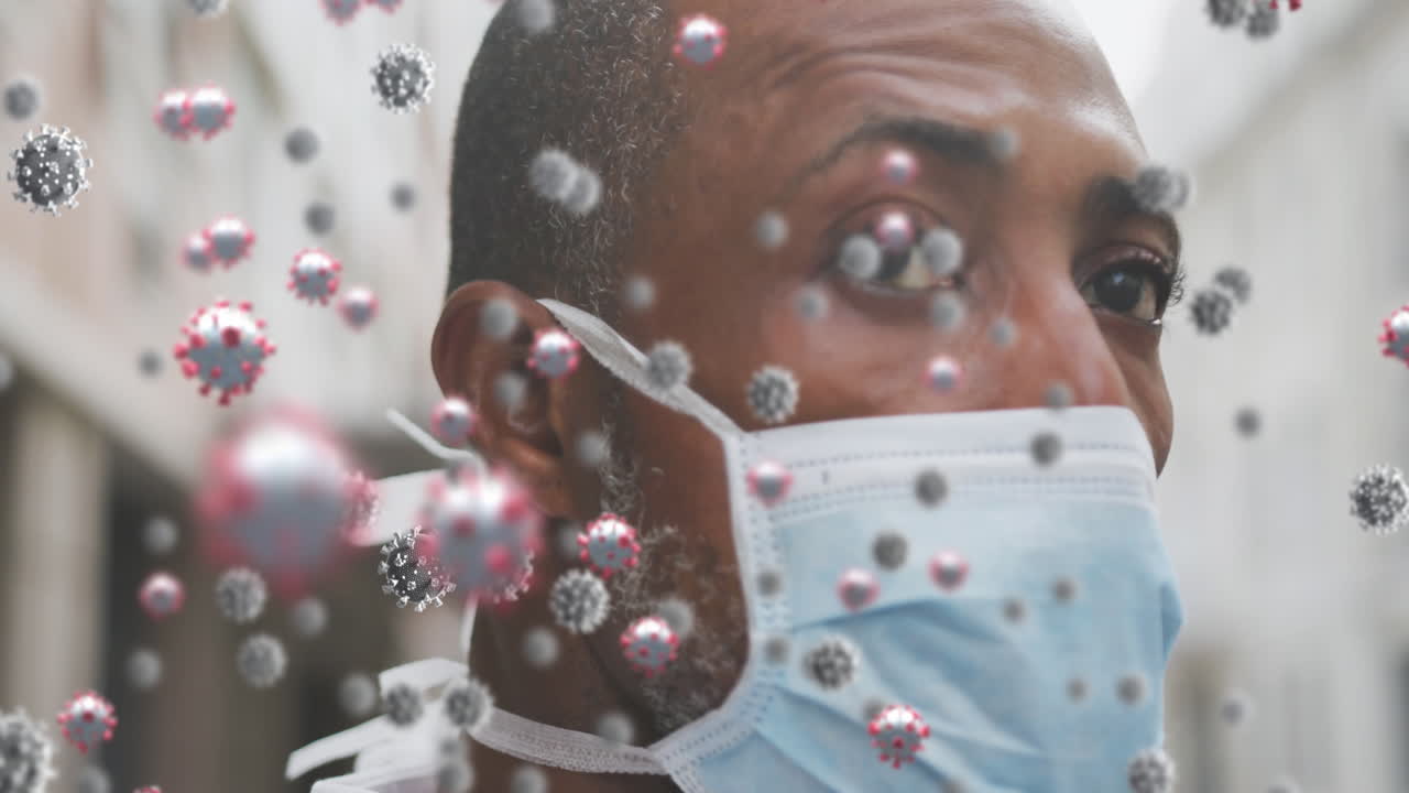animación de células de covid-19 sobre un hombre que usa una máscara facial