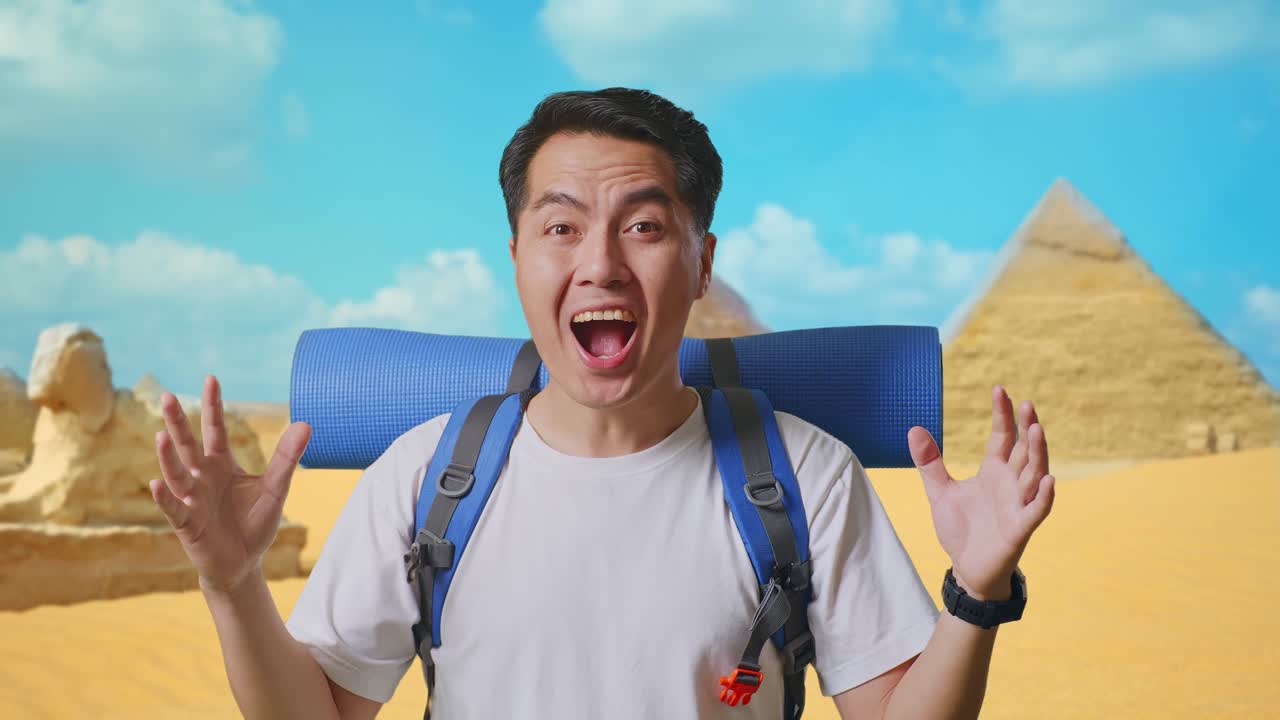 Close Up Of Asian Male Hiker With Mountaineering Backpack Saying Wow While Traveling In Pyramid Of Giza