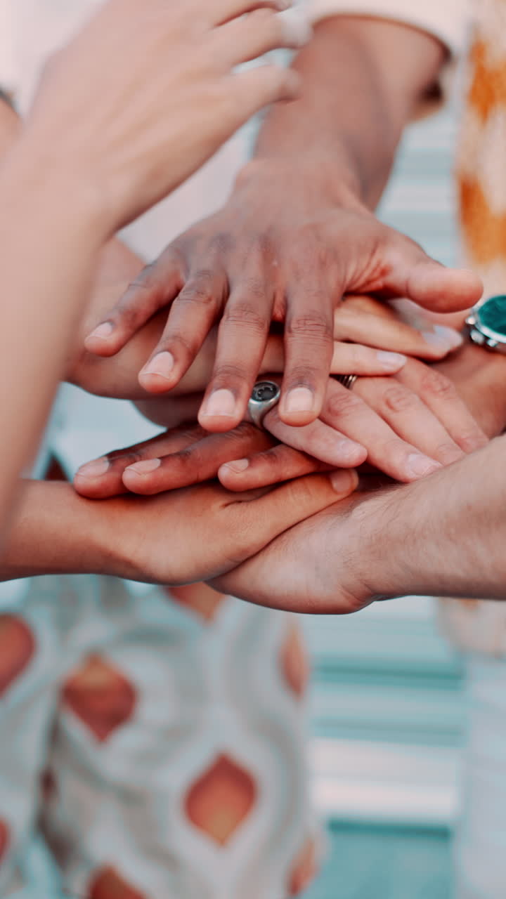 Close-Up of Diverse Hands Stacking Together in Unity for Teamwork