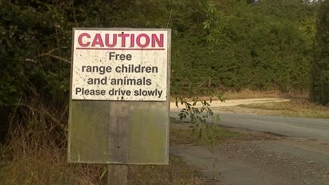 A sign made by a UK farmer letting his children and animals are somewhere near