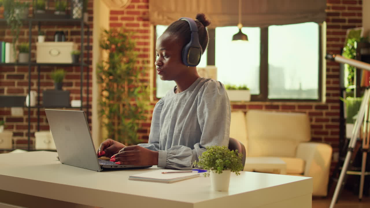 Freelancer enjoys working at workstation