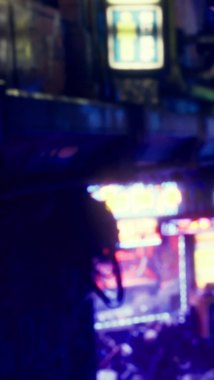 Bright lights and people on the street during late hours in the city