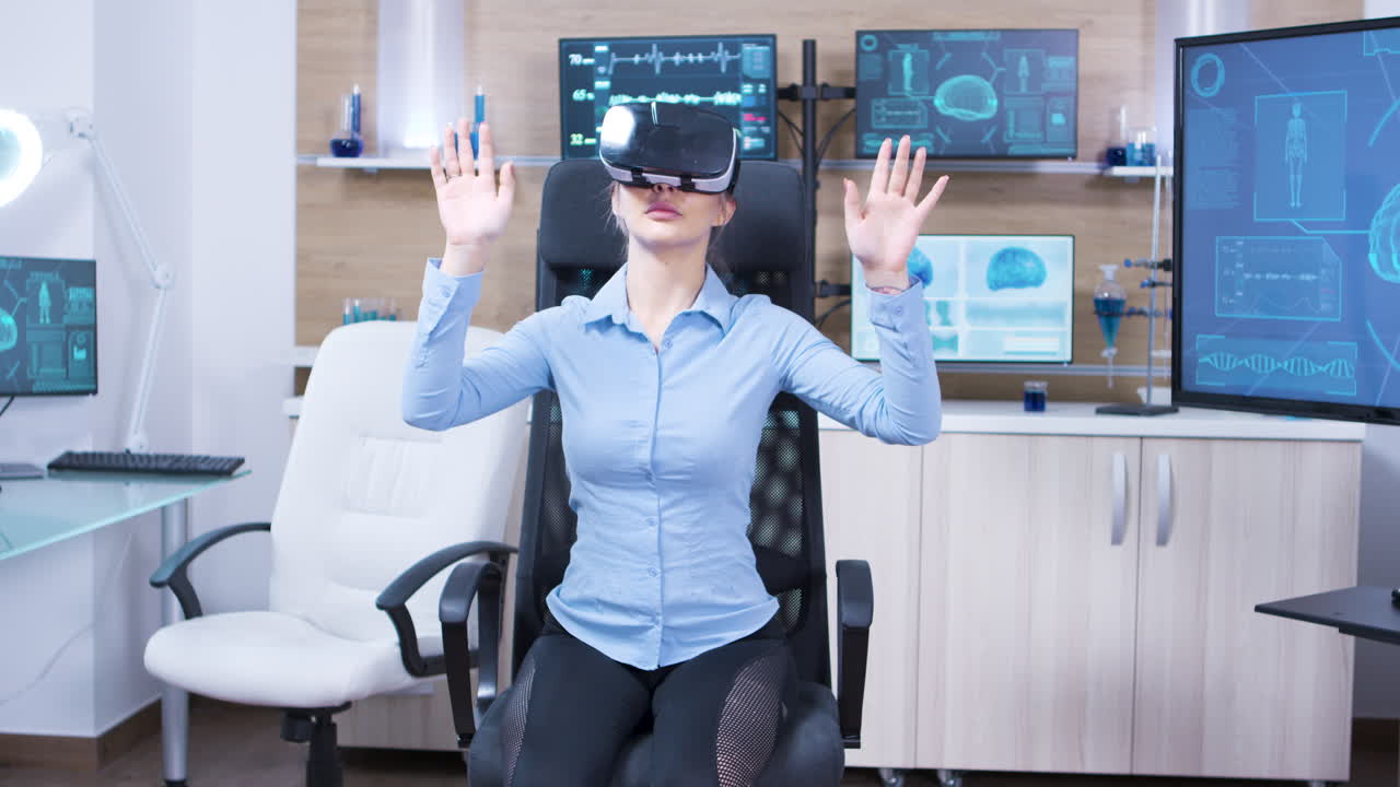 Young female using virtual reality goggles in a neurology lab science