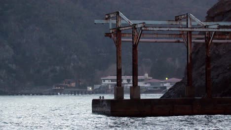 abandoned pier at dusk