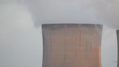 Industrial-cooling-tower-power-station-chimneys-smoking-steam-pollution,-close-up-on-smoke.