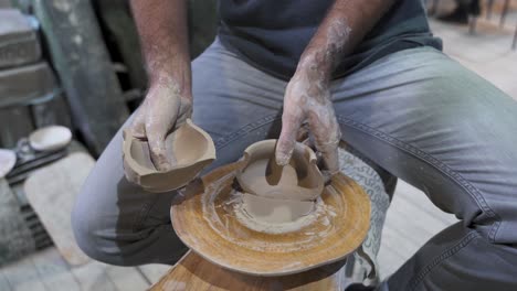 pottery workshop: shaping clay on a potter's wheel