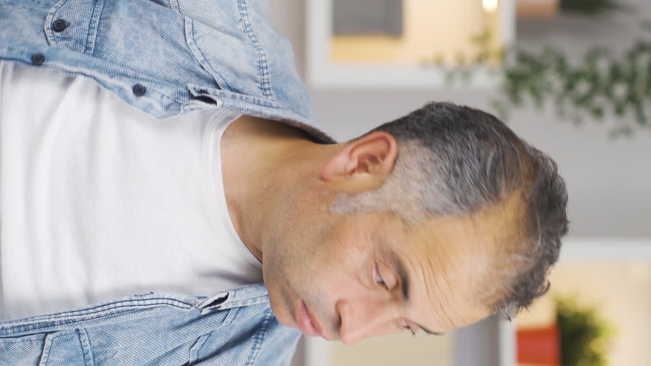 Vertical video of He's a man with a fussy and time pressure.