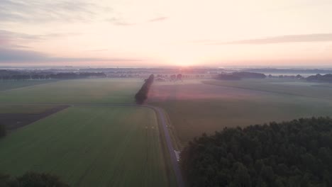 sunrise over dutch farmland