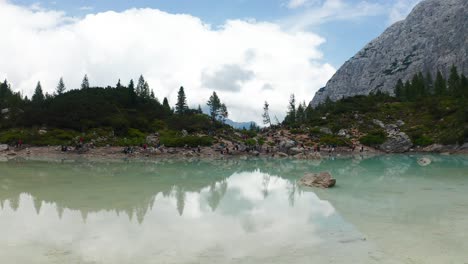 Aerial-Low-Flying-Over-Lake-Sorapis-In-The-Dolomites