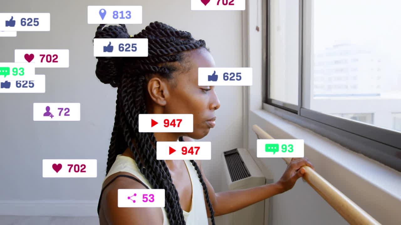 Looking out window, woman with braided hair surrounded by animation notifications