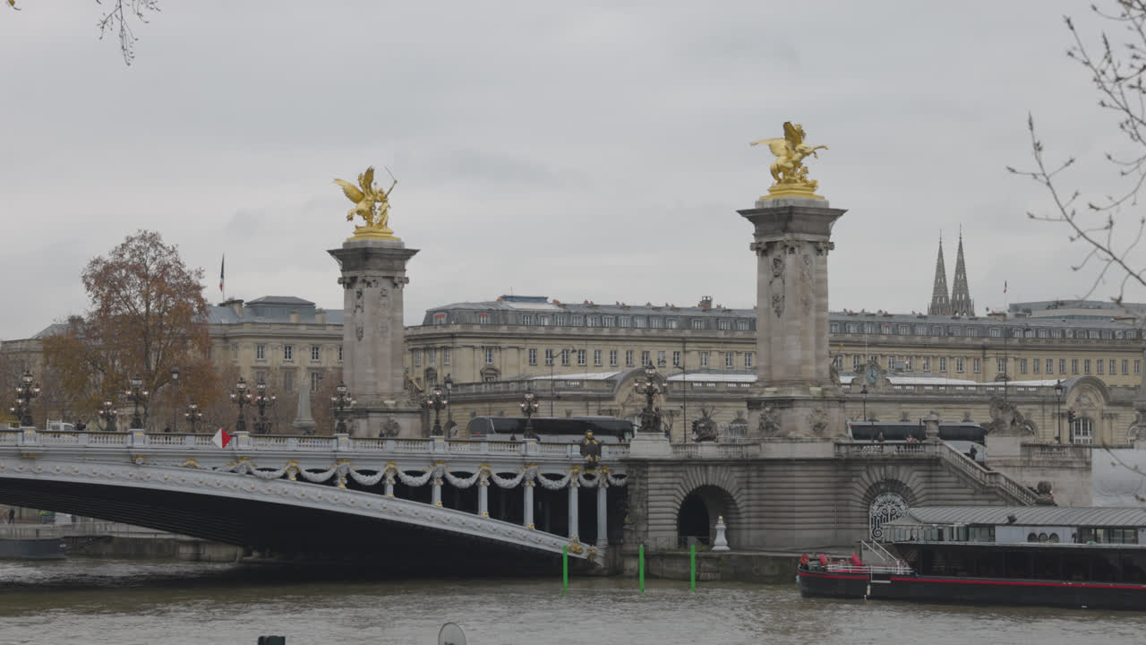 Moody Elegance: Alexander III Bridge on a Cloudy Day