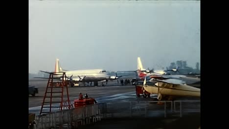 turin airport with airplane from the 1960s