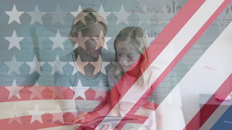 american flag pattern and constitution text against caucasian mother and daughter reading a book
