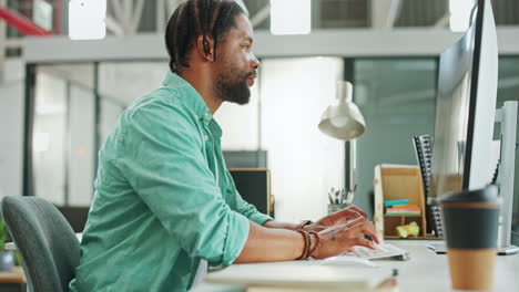 tablet, computer and black man typing in office