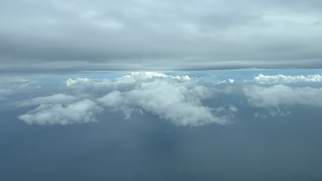 flying across a winter sky while flying over the mediterranean sea at 4000m high