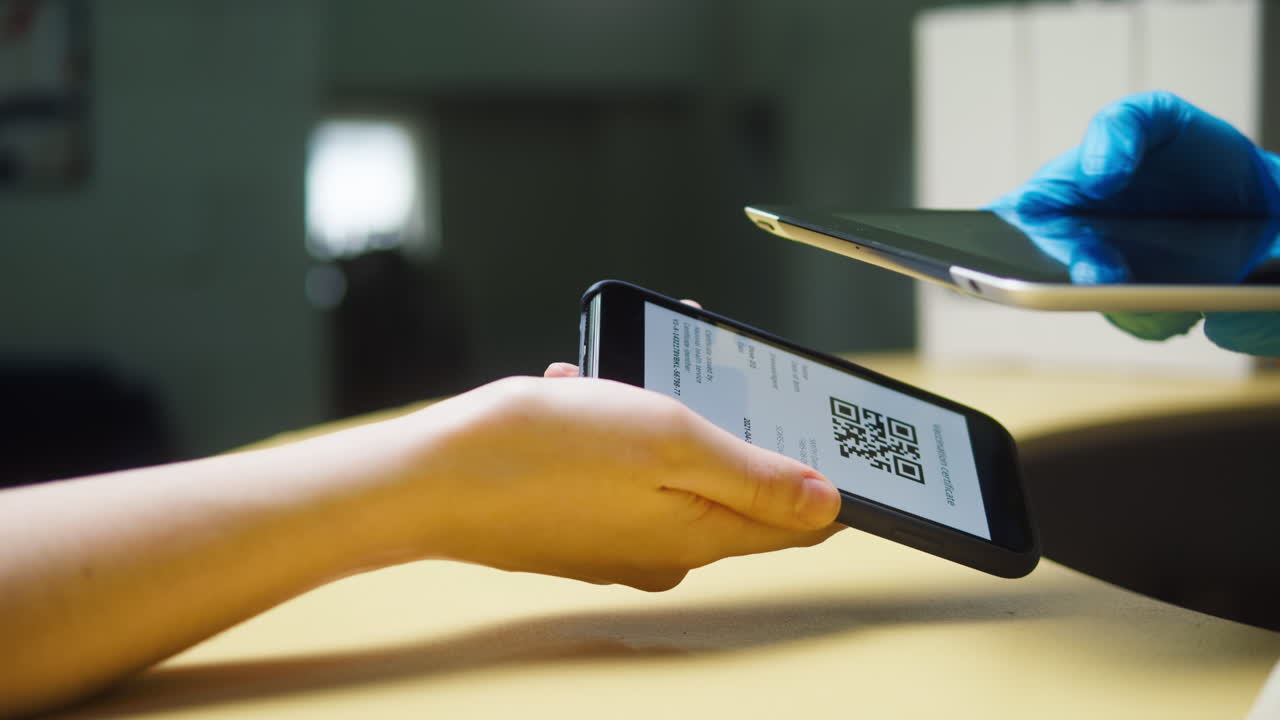 Scanning QR Code from Smartphone with Tablet for Digital Certificate