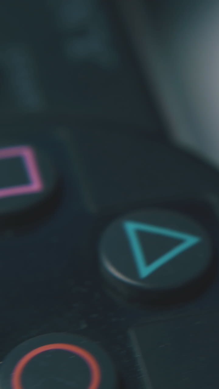 modern joystick with buttons for playing video games located on white clean background macro