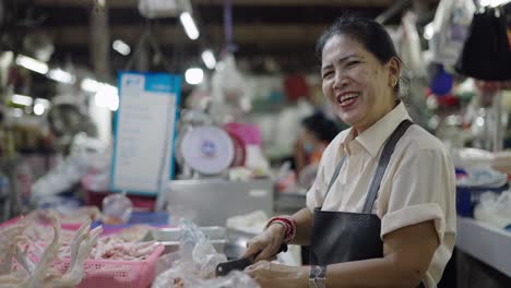 woman working at a fresh food market