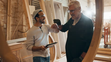 carpenters working in a workshop