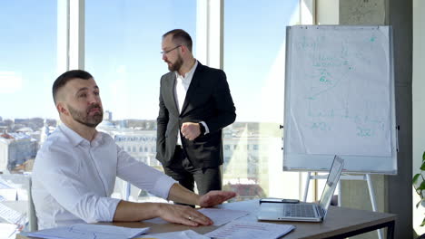colleagues at modern coworking office. young business people working and communicating together in creative office