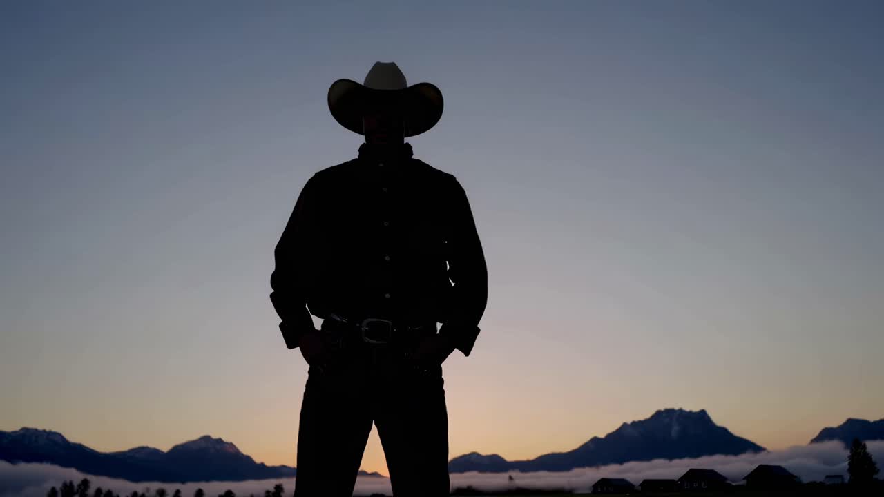 Cowboy Silhouette at Sunrise