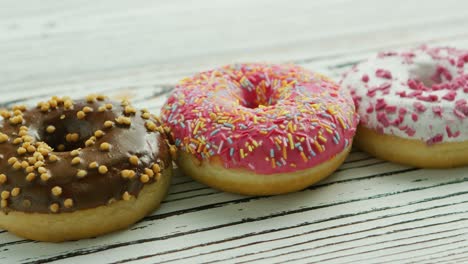 row of sweet glazed doughnuts