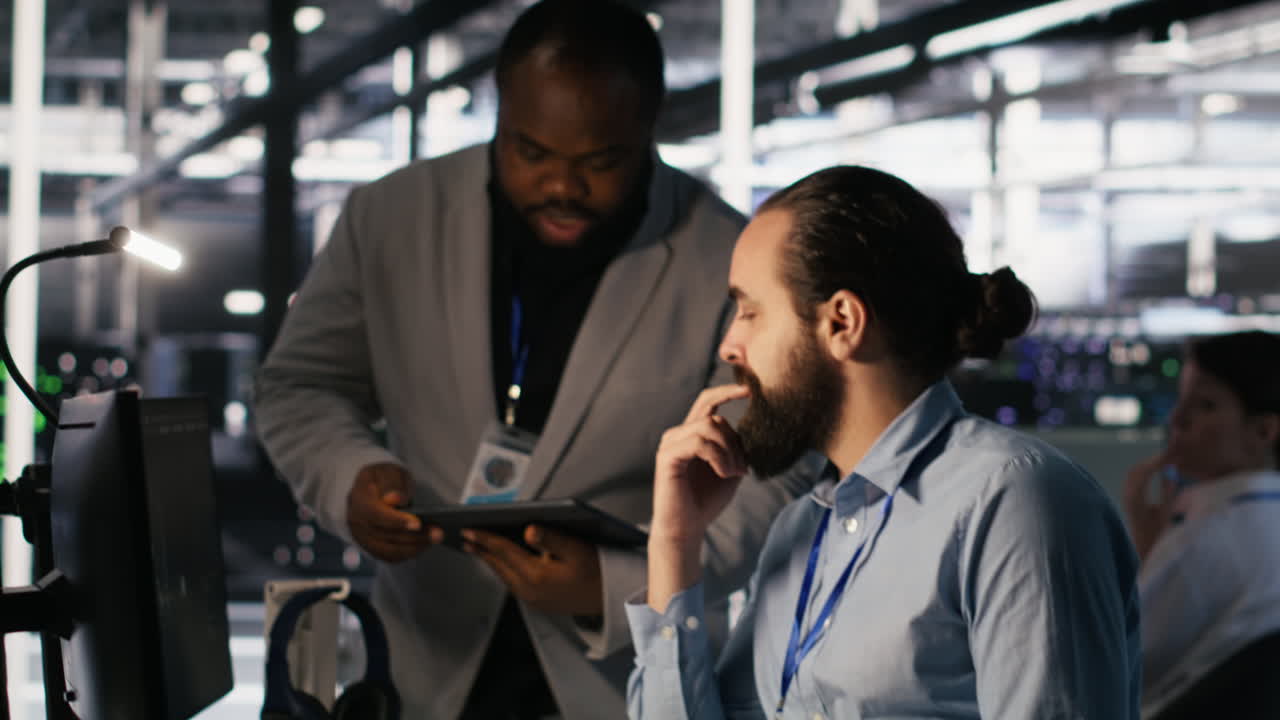 Vertical video Data center system administration team collaborating on AI automation
