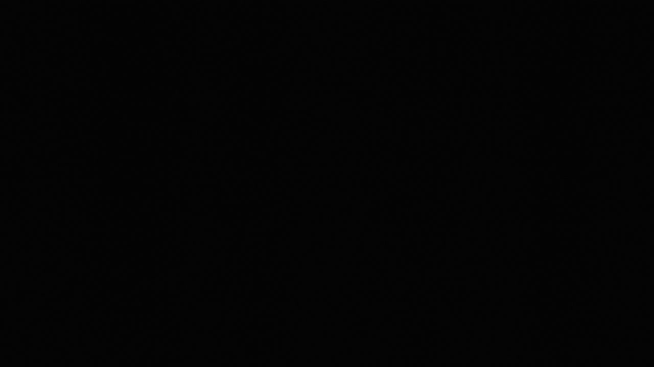 Una luz roja parpadea sobre un fondo negro 1
