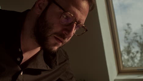 man working indoors