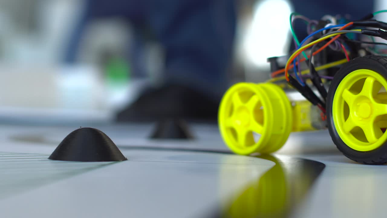 robot on wheels constructed by programmers at a robotics competitions. Education of children