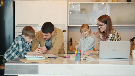 family homework time in the kitchen