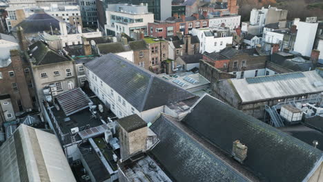 Drone-shot-around-Anne's-Lane-known-as-umbrella-street,-Dublin,-Ireland