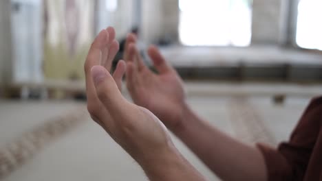 close-up praying hands