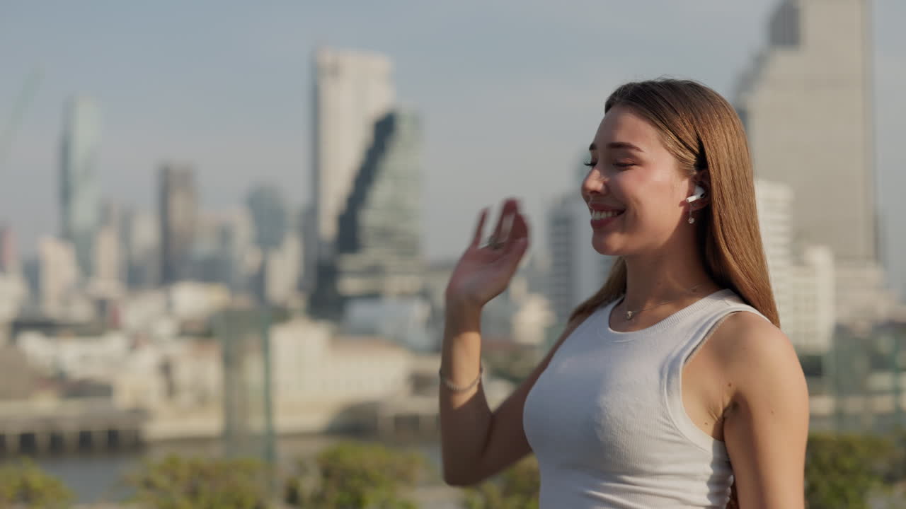 Woman listening to music in city