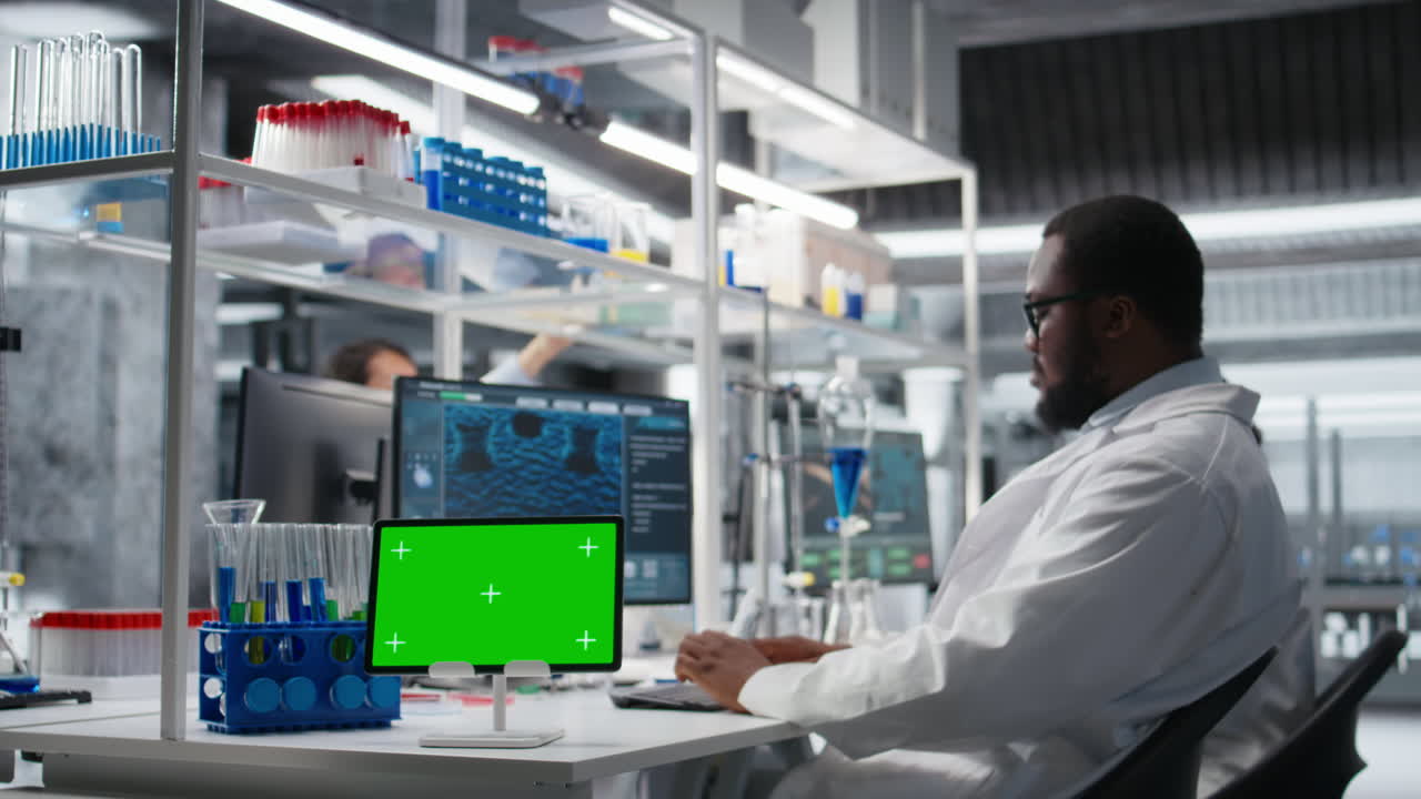 Vertical video Scientist using mockup tablet app in laboratory, driving treatment discovery