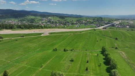 road construction site, infrastructure development of lesser poland countryside, aerial