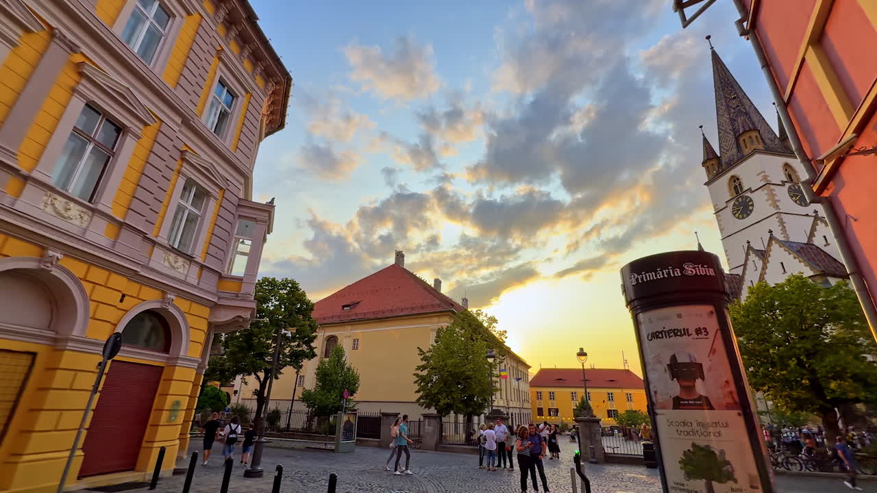 Sibiu, Romania, 17 July 2025: Colorful historic houses in Sibiu. Old houses with red tiled roofs and colorful facades in Sibiu, Romania