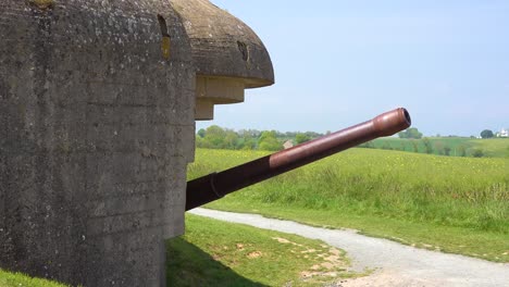 an anti-aircraft artillery bunker ruins along the coast of normandy france reminds visitors of d-day world war two