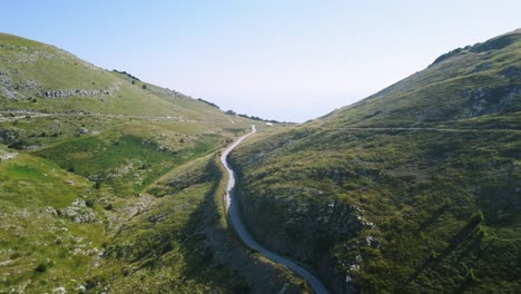 aerial of the end of mountain road at high altitude