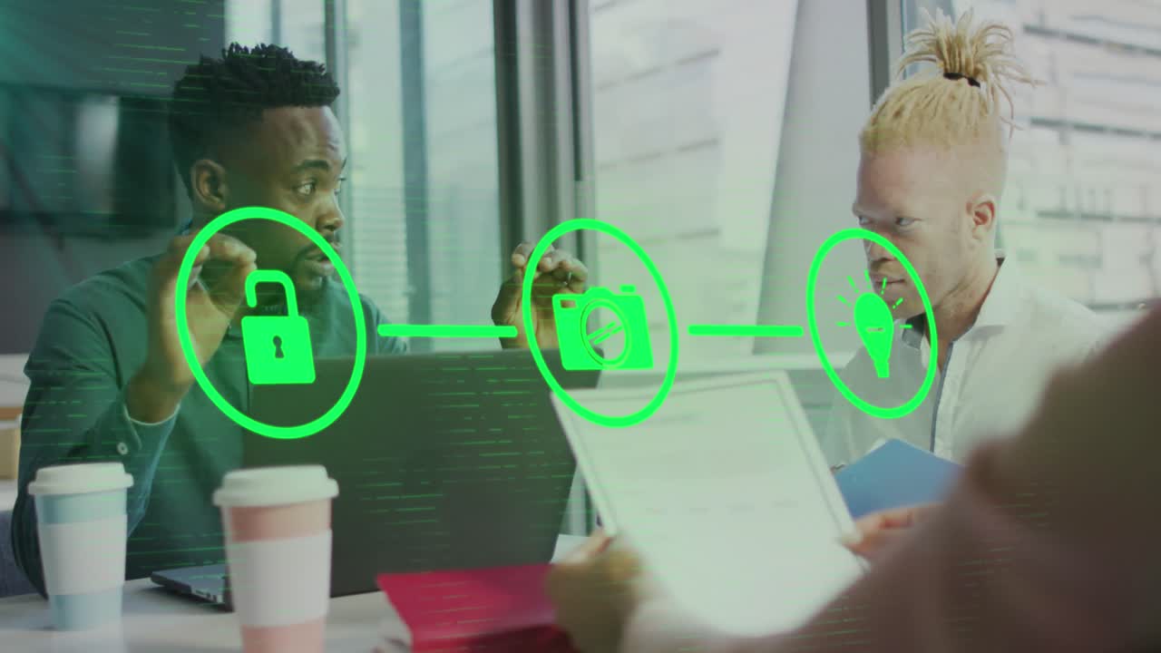 Animation of flowchart of icons over diverse coworkers discussing reports on laptop in office