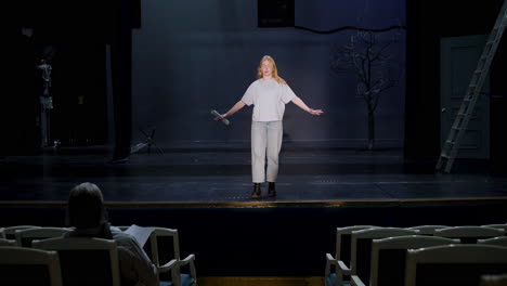 actress performing on the stage