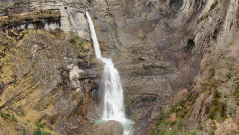 sorrosal waterfall: aerial view in orbit over the beautiful waterfall in the province of huesca, aragon, on a sunny day